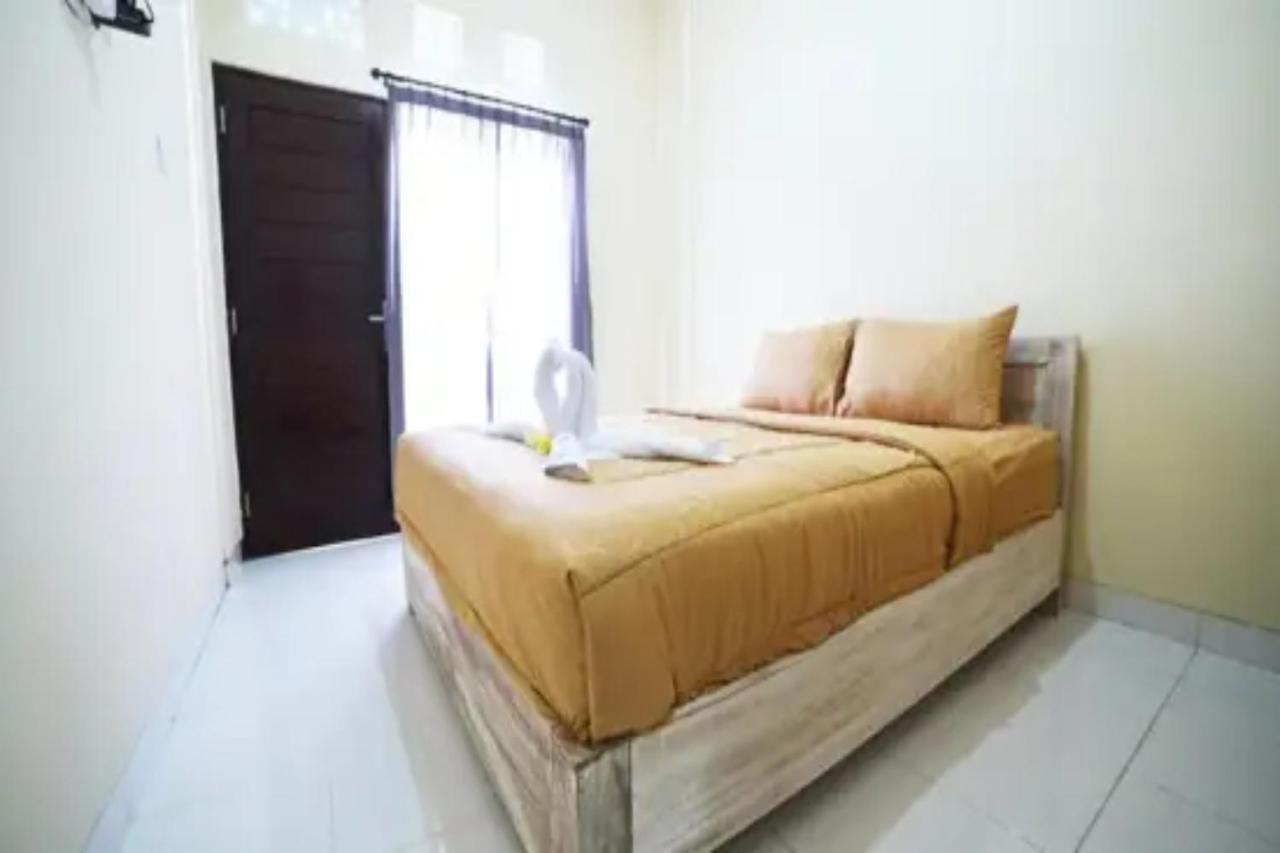 Oyo Flagship 91237 Ratu Guest House Kedunganan Экстерьер фото