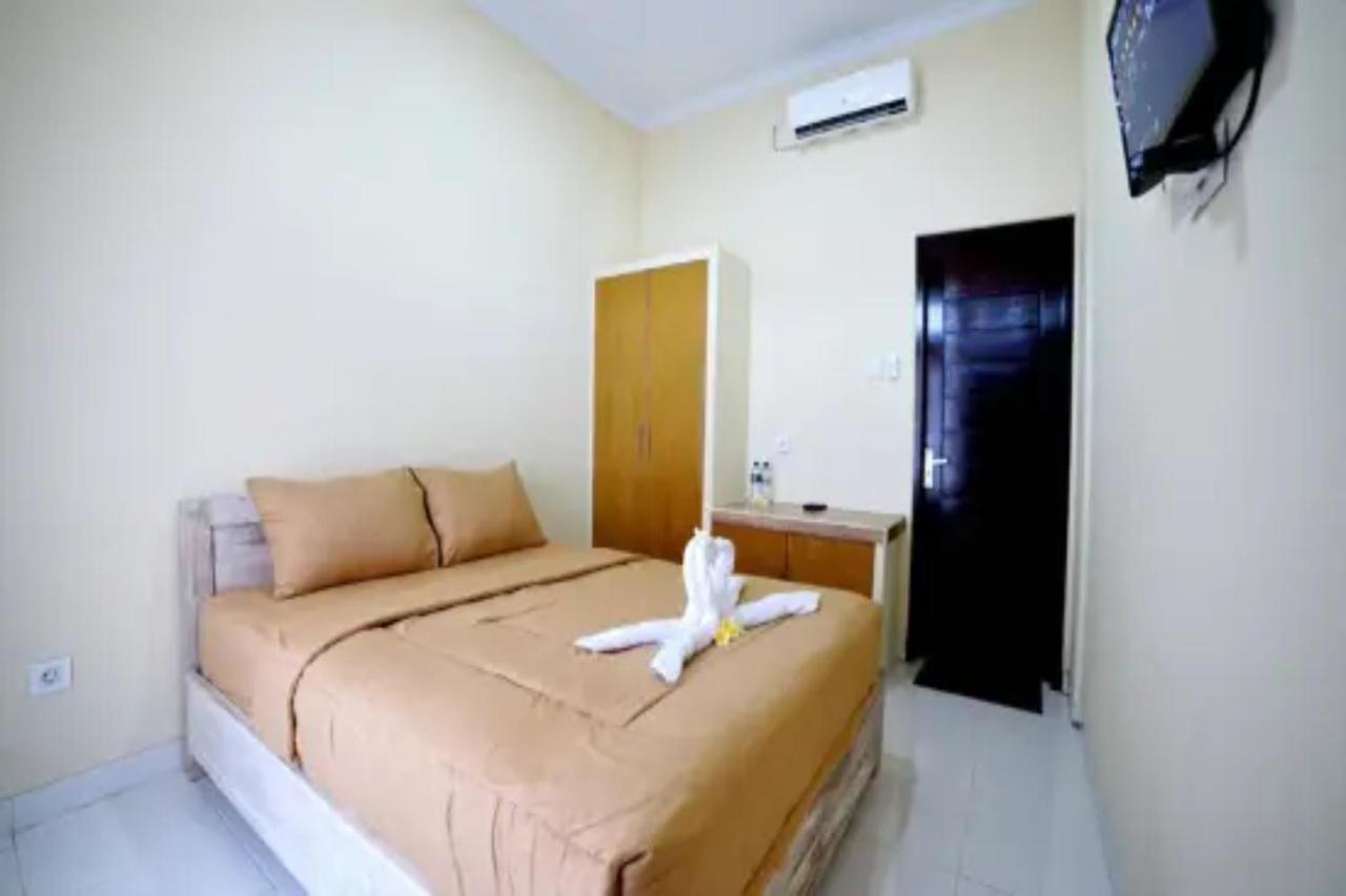 Oyo Flagship 91237 Ratu Guest House Kedunganan Экстерьер фото